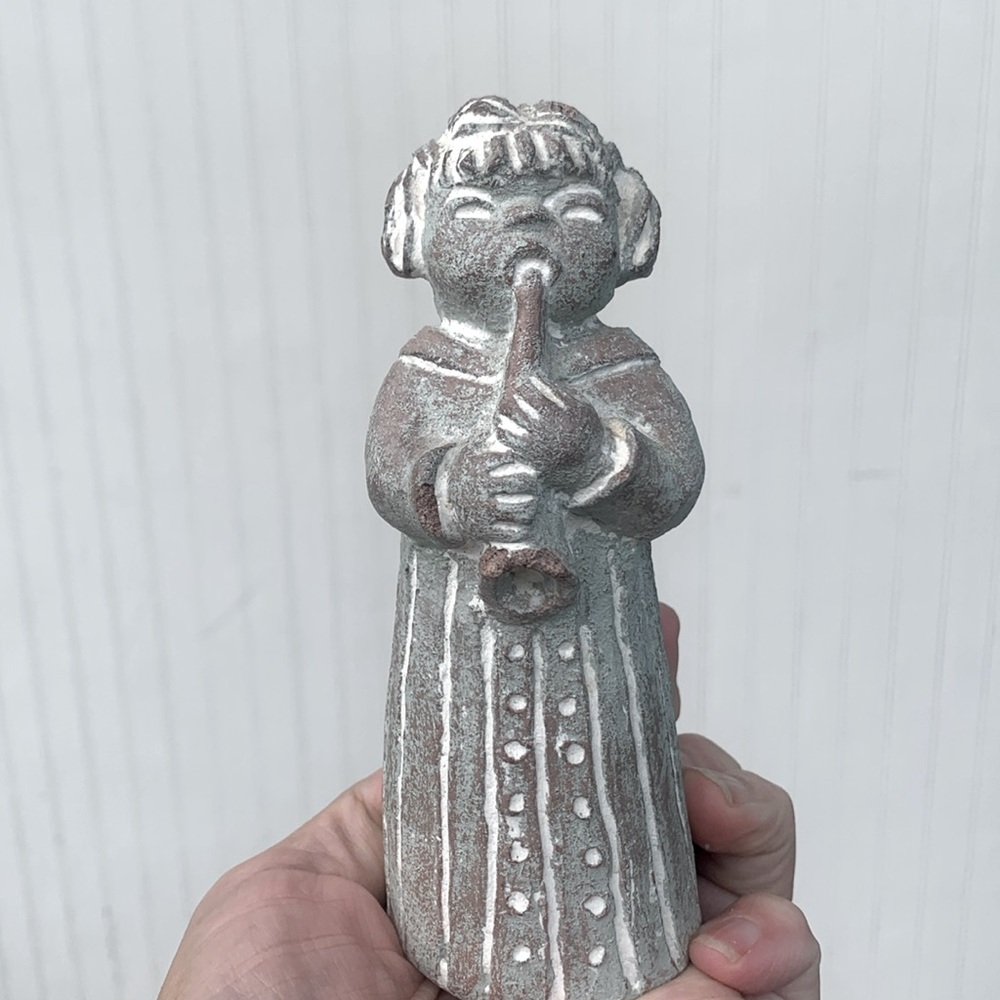 Isabel Bloom angel statue horn instrument